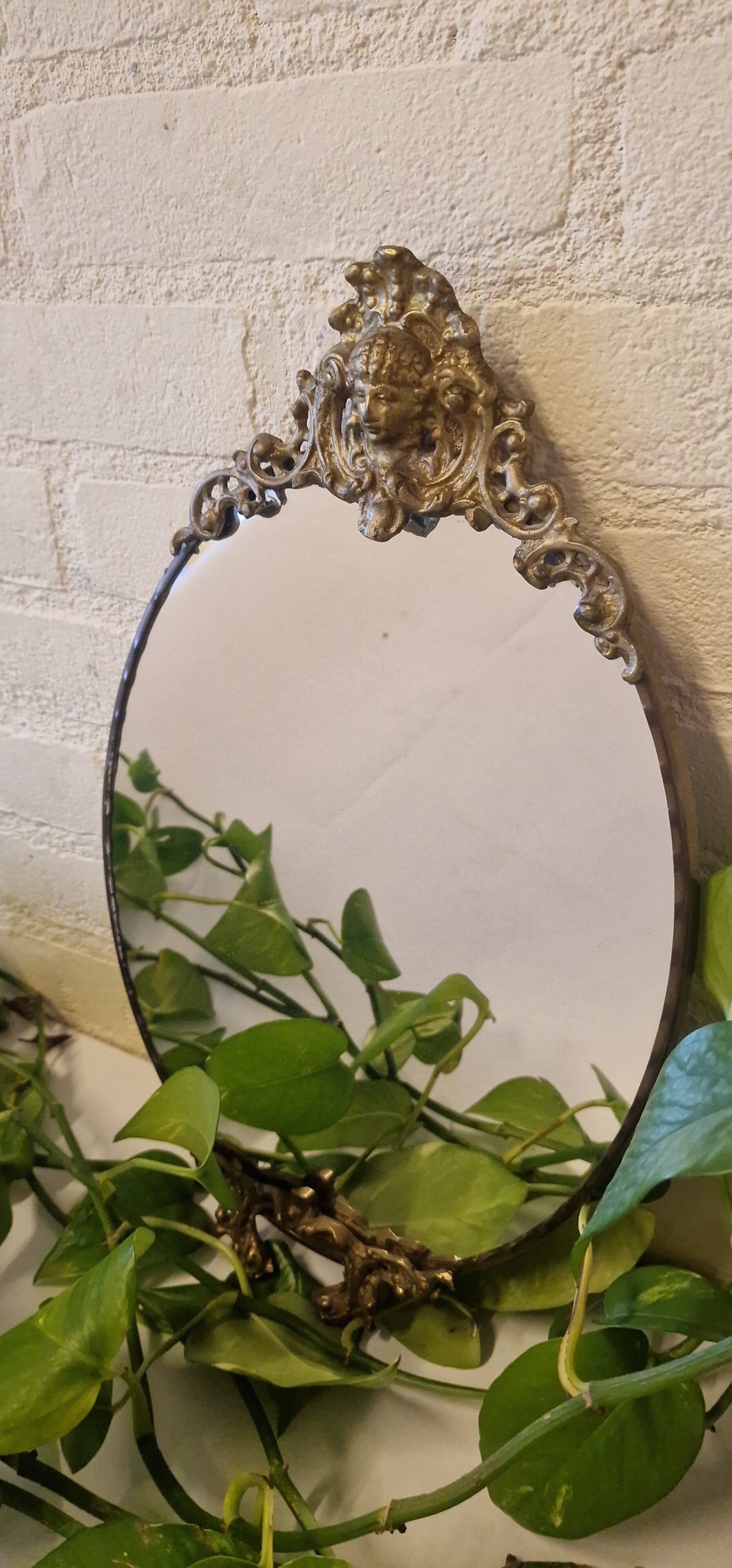 Antieke messing kuifspiegel