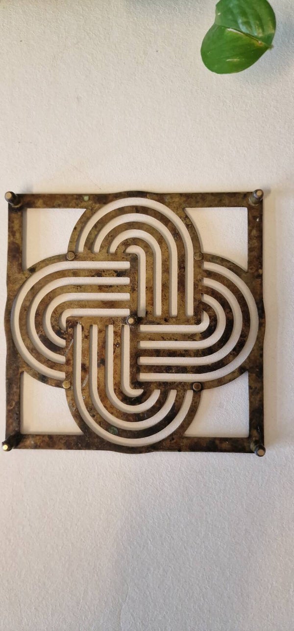 Vintage onderzetter in Art Deco stijl, messing