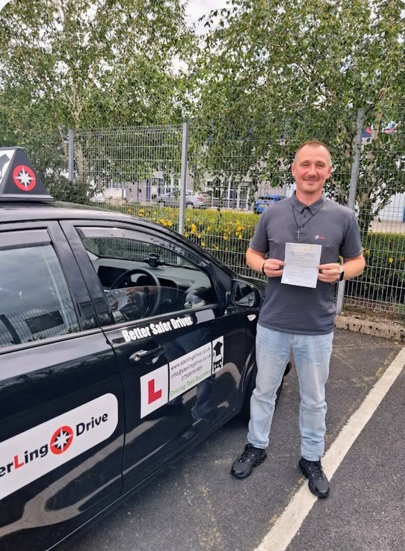 Sterling Drive driving lesson pupil with practical test pass certificate