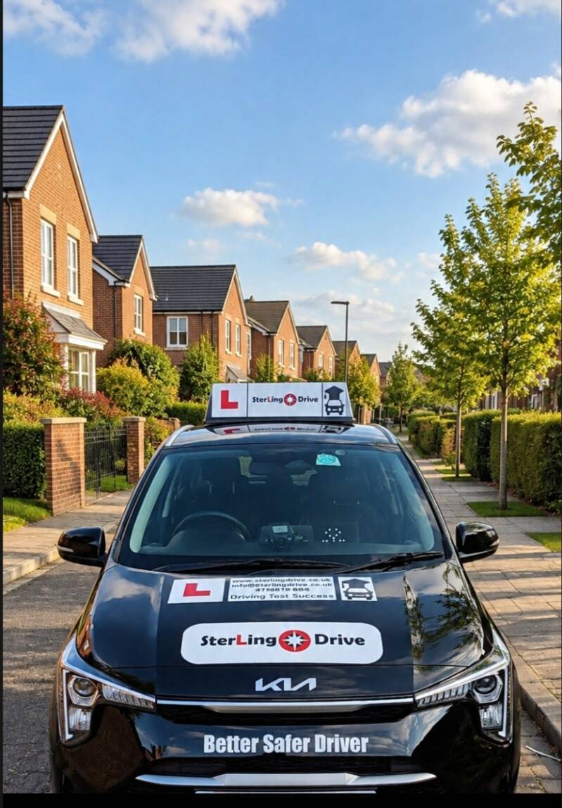 Sterling Drive driving school car in Bolton with L plates and roof sign