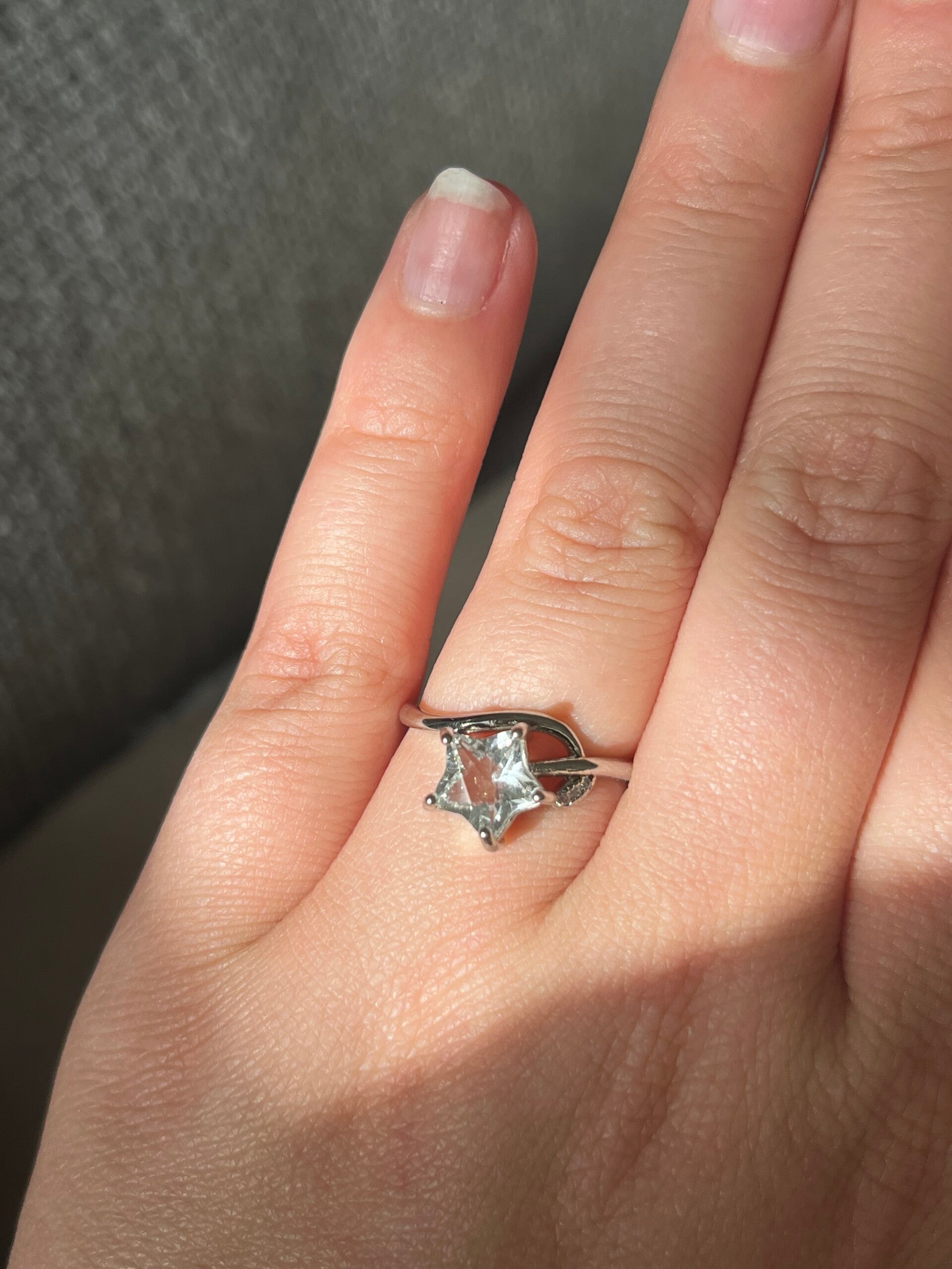 Clear quartz ring stervormig zilverkleurig
