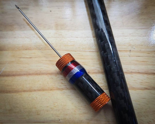 Custom carbon needle Holland