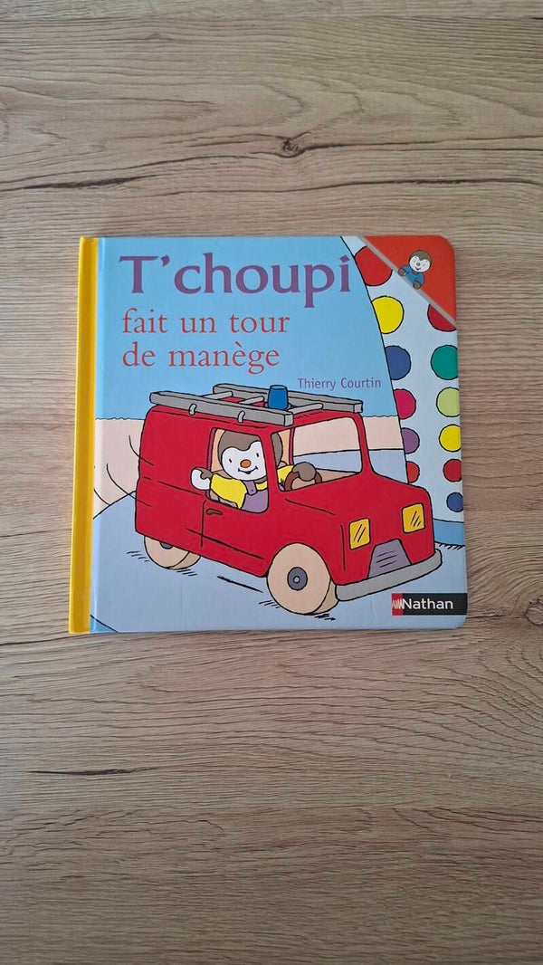 T'choupi fait un tour de manège