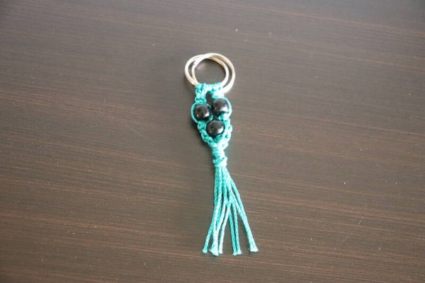 Sleutelhanger met zwarte kraal