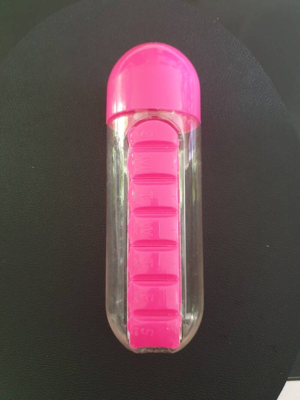 Bouteille avec pilulier intégré rose