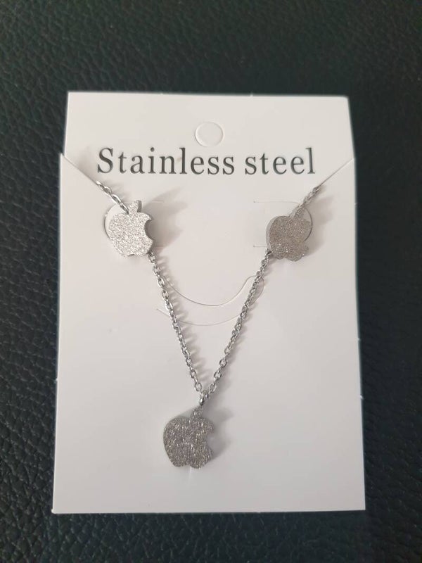 Parure argentée pomme croquée