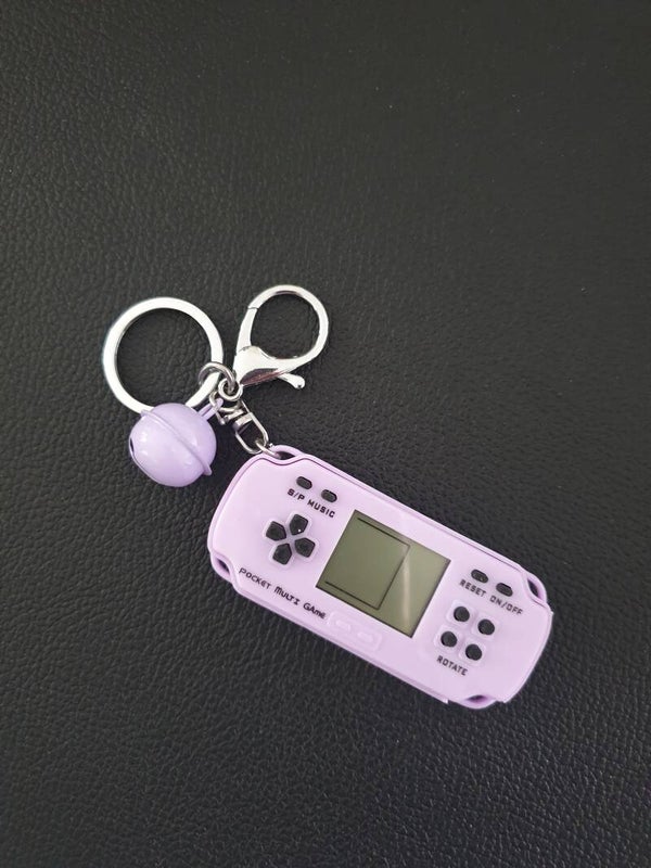 Porte-clés console avec plus de 20 jeux intégrés violette