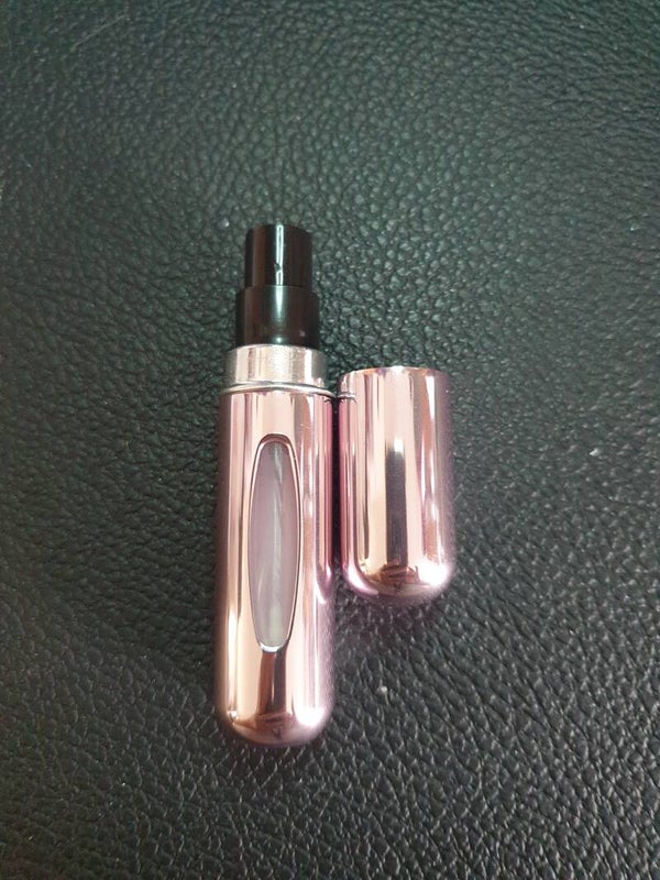 Vaporisateur de sac magique rose clair brillant