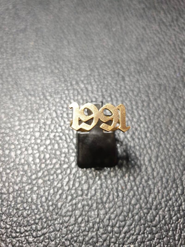 Bague fantaisie ajustable "1991" dorée