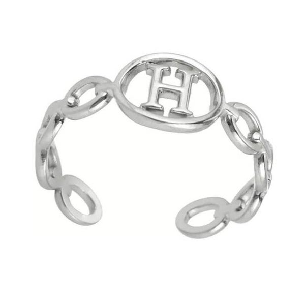 Bague fantaisie ajustable "H" argentée