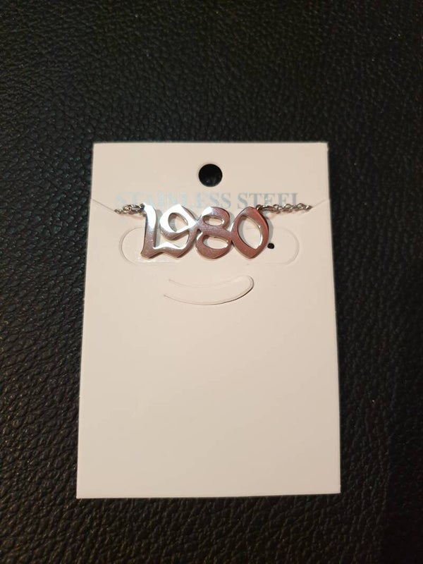 Collier fantaisie "1980" argenté