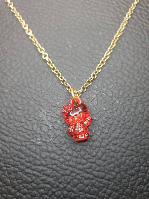 Collier fantaisie "Hello Kitty" rouge chaîne dorée