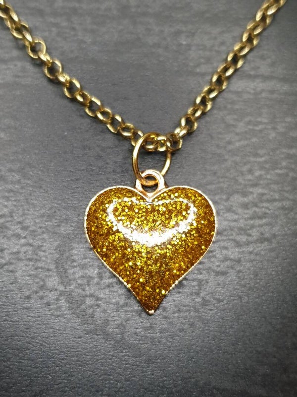 Collier fantaisie "Cœur" pailleté doré