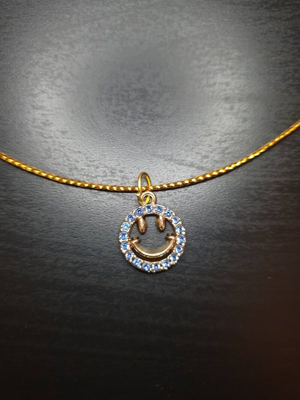 Collier fantaisie "Smiley" diamant bleu cordon doré
