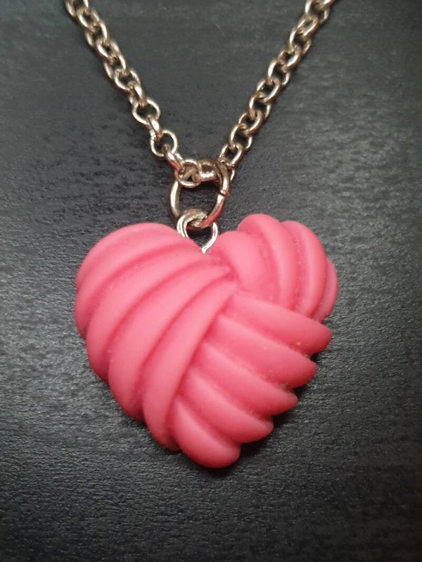 Collier fantaisie "Cœur tressé" rose