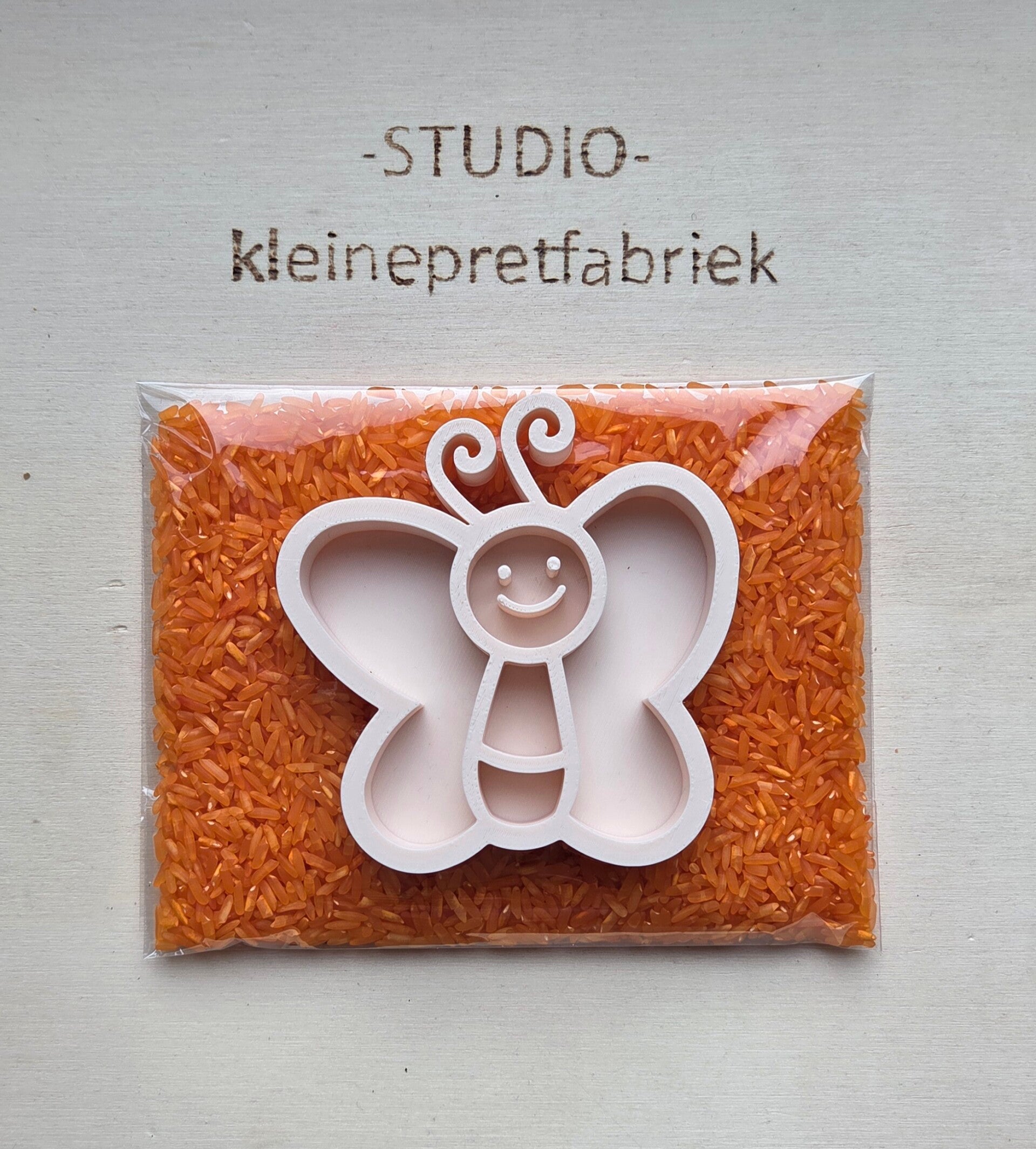 Speelrijst met vlinder vulvorm - Kant en klare traktatie