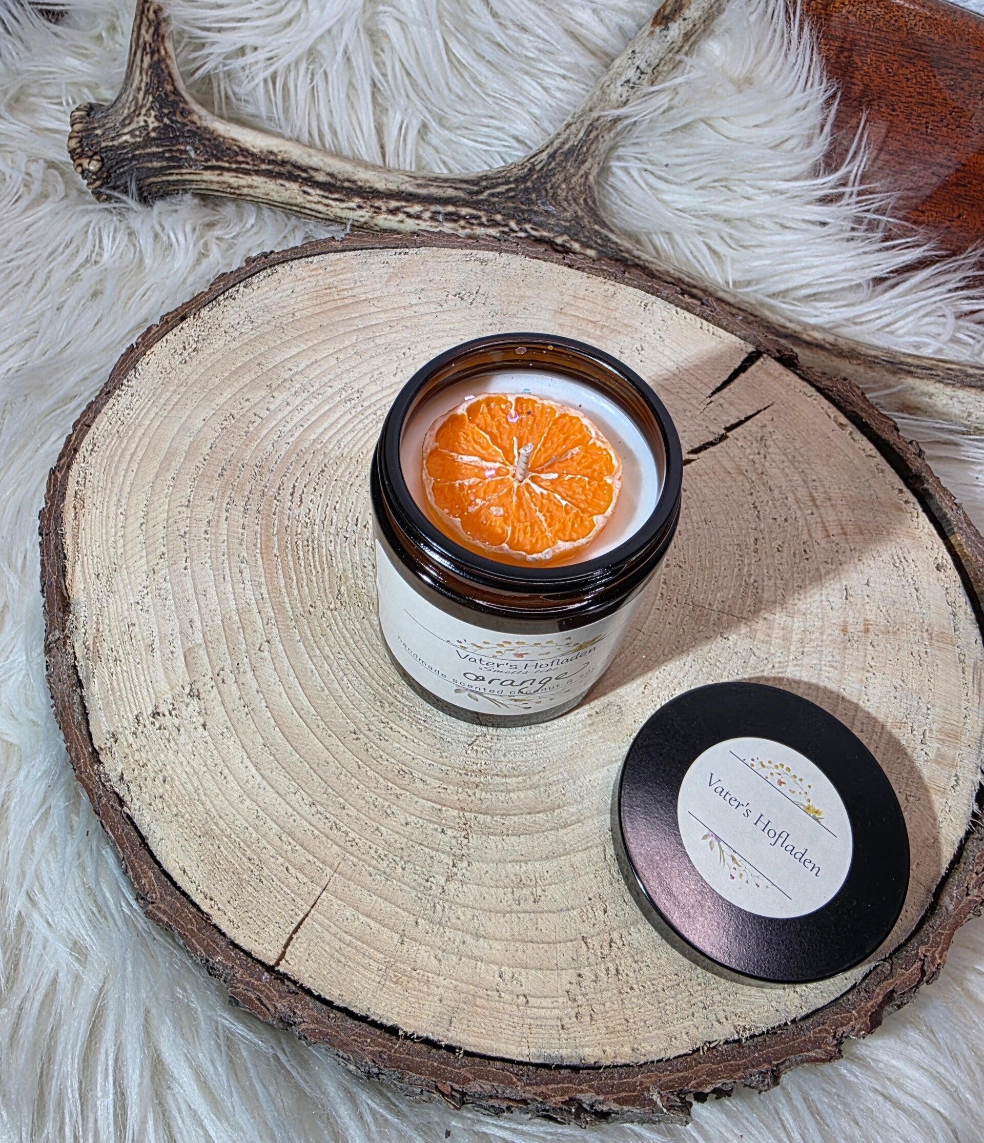 kleine braune Duftkerze orange