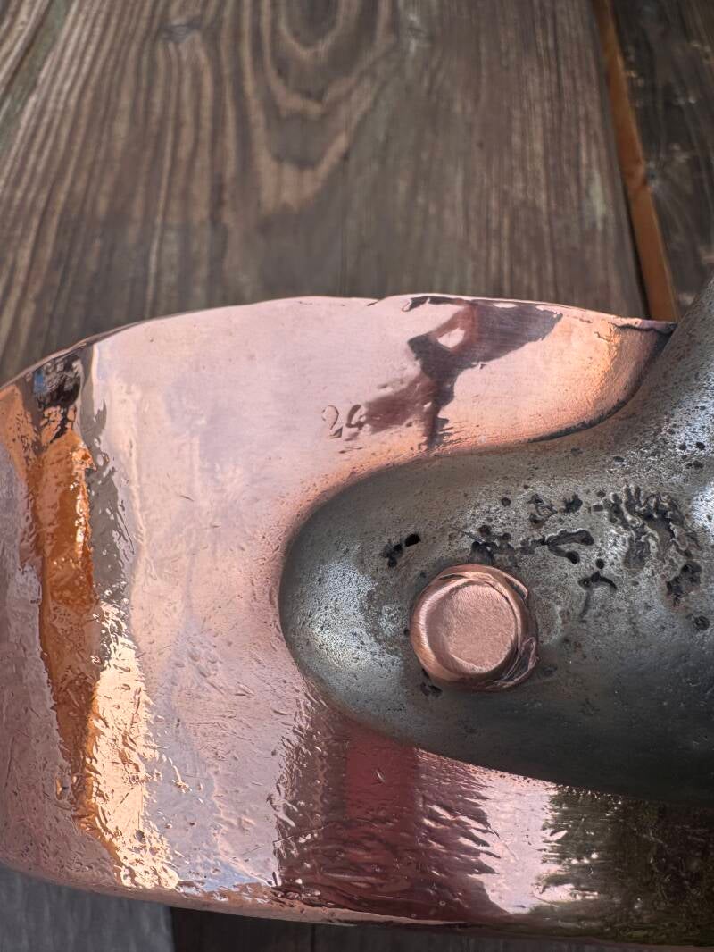 Handle repair detail - wrought cast iron with historic crack