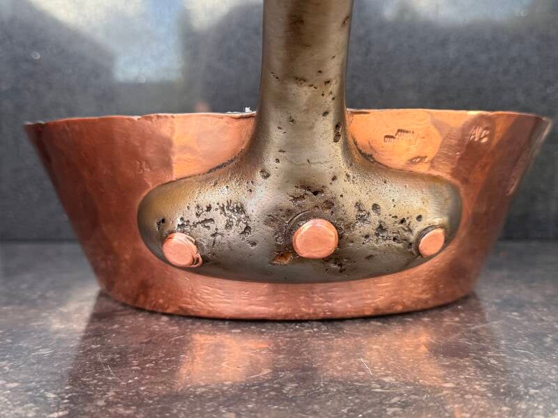 Wrought iron handle base with copper rivets - heavily used patina