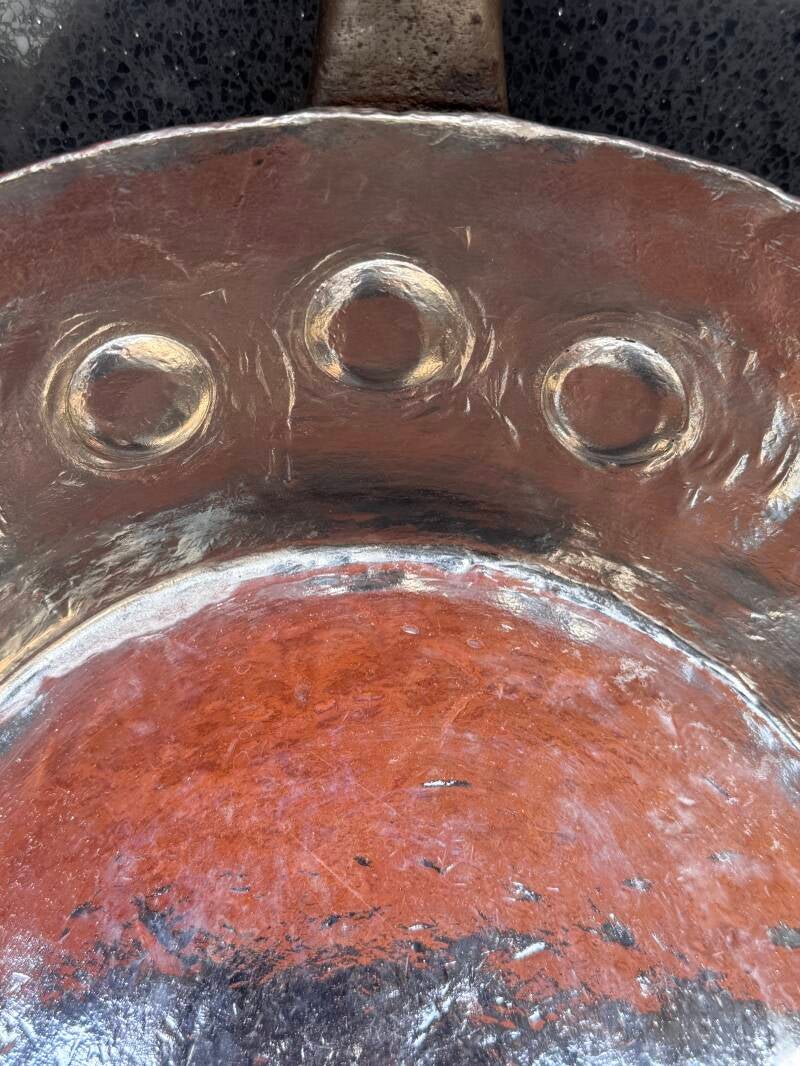 Copper rivets wrought iron handle interior