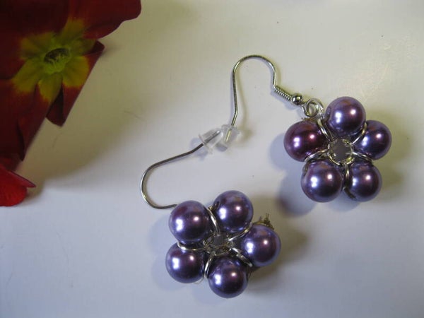 Paire de Boucles d'Oreilles en forme de fleur !