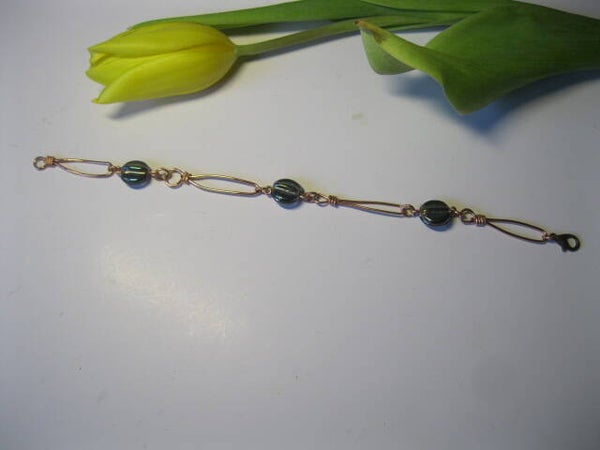 Bracelet avec perles en forme du grain du cafe