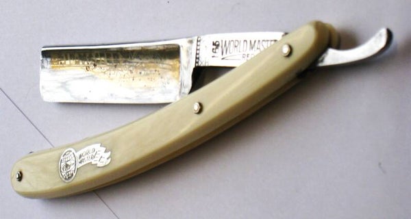 Klassiek gebruikt World-Master  5/8 open scheermes uit 50s