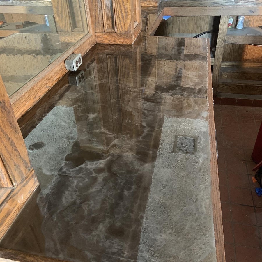 Concrete floor being prepared for a new coating