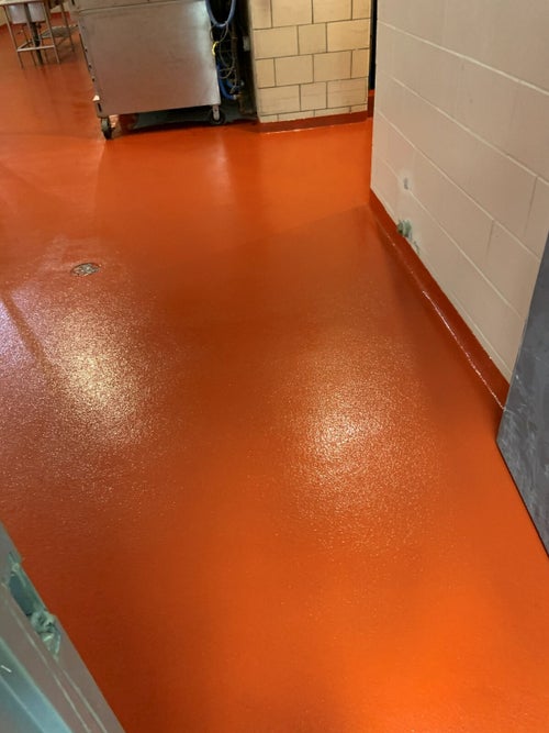 Red solid-color epoxy floor by ProResin Flooring Solutions