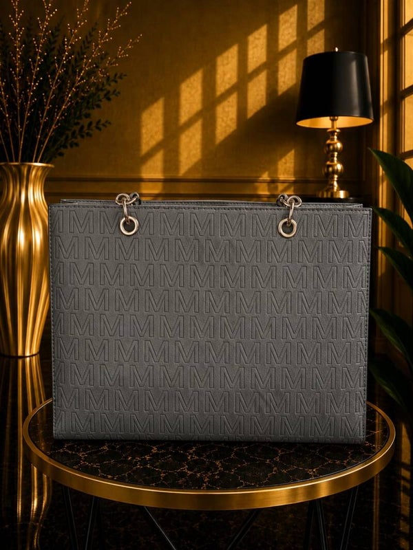 Tas met M logo recht grijs