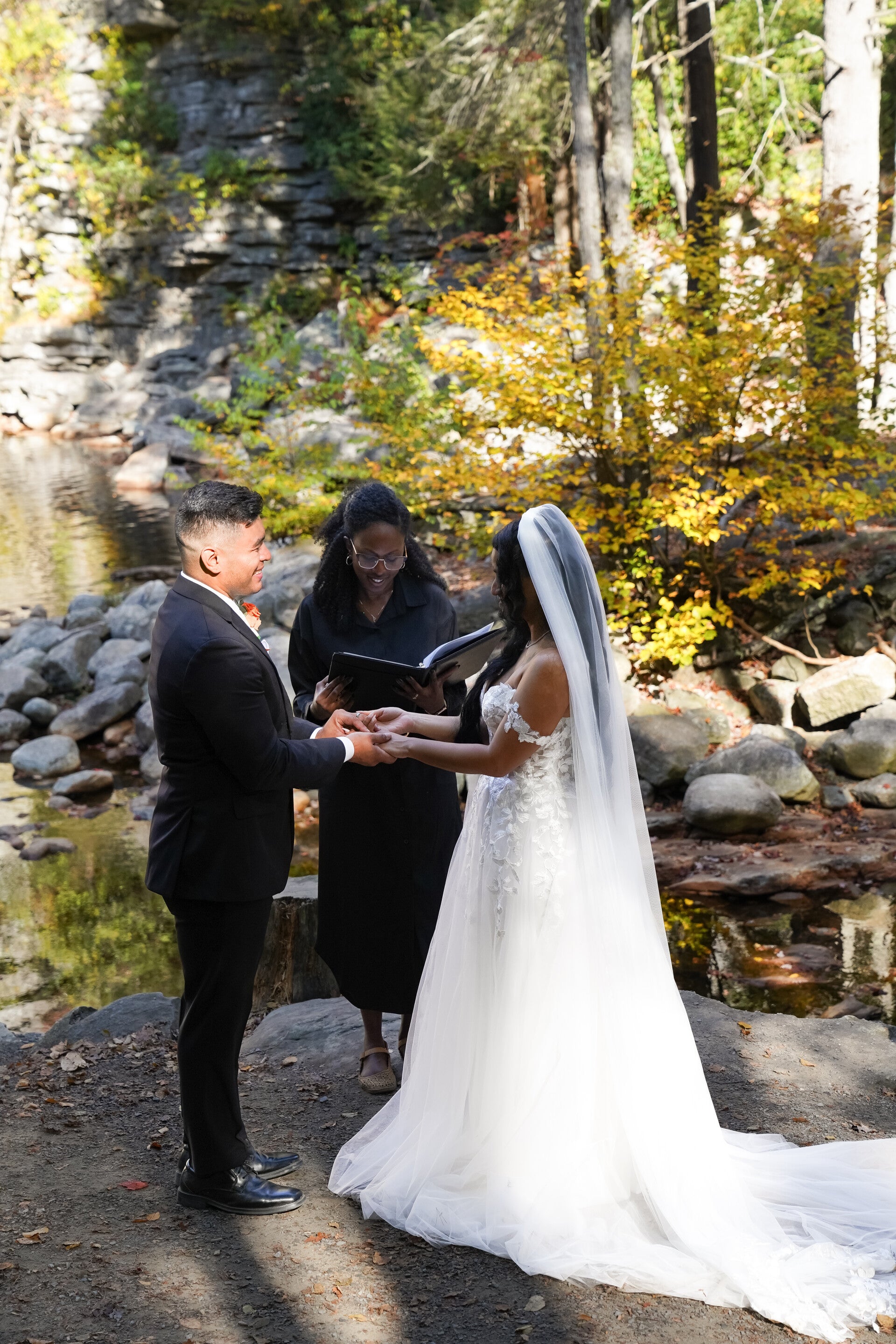 Wedding officiant leading intimate outdoor ceremony in Hudson Valley NY