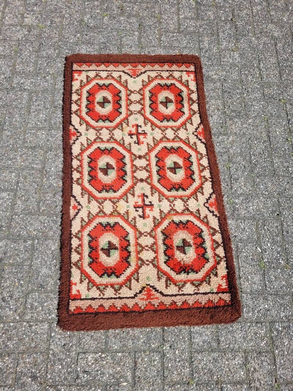 Handgeknoopt wollen tapijt jaren 70