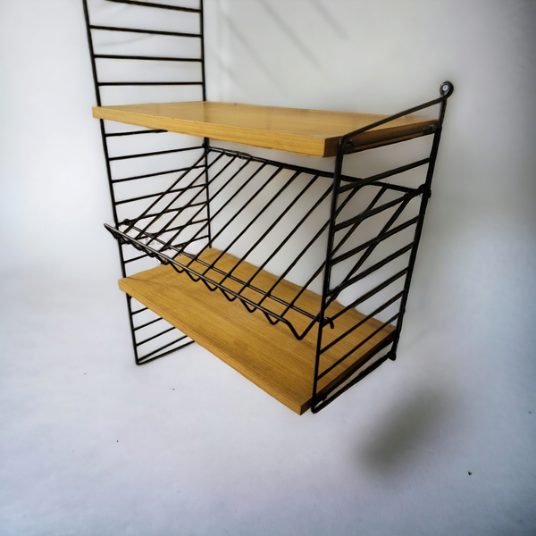 Nisse String met lectuurrek