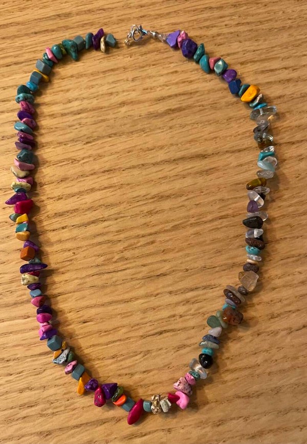 Zilverkleurige ketting bedels