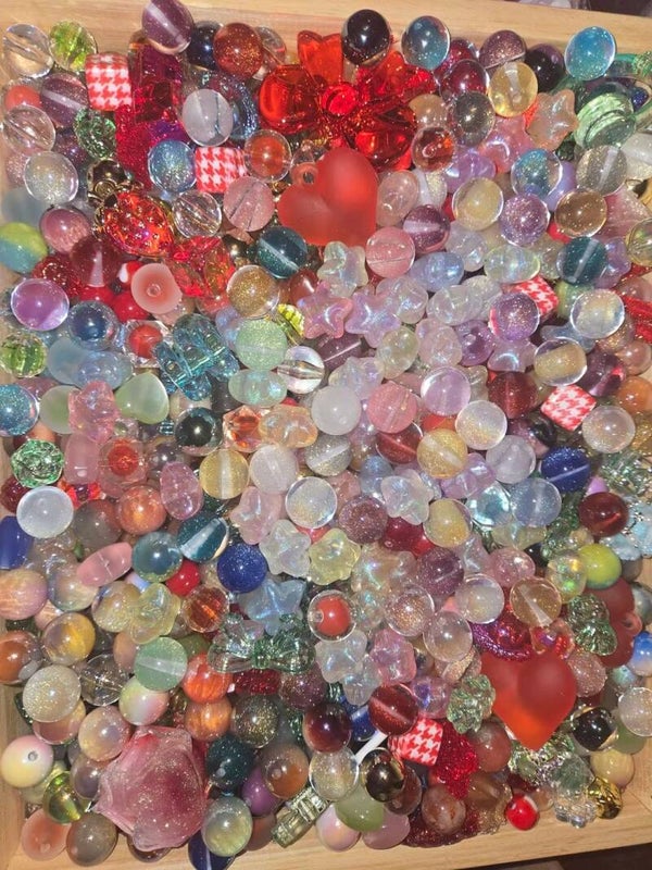 1 cup mixed beads with pen