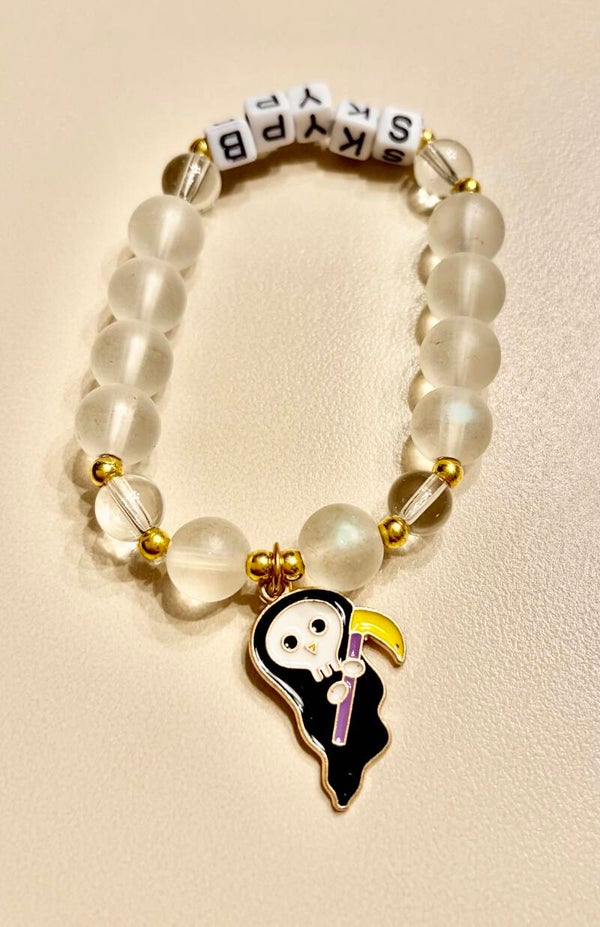 Halloween - Clear Beads Stretch Halloween Bracelet with Grim Reaper Charm.