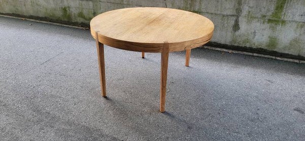 Runder ausziehbarer Esstisch aus Holz