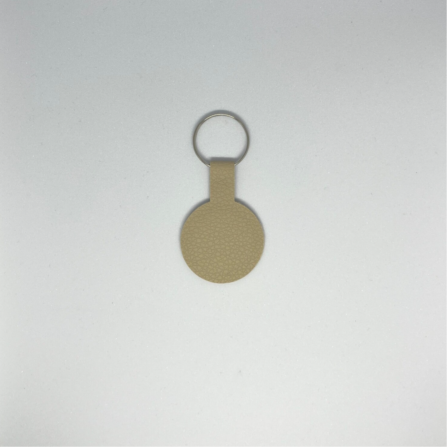 Tag&#x20;sleutelhanger&#x20;beige