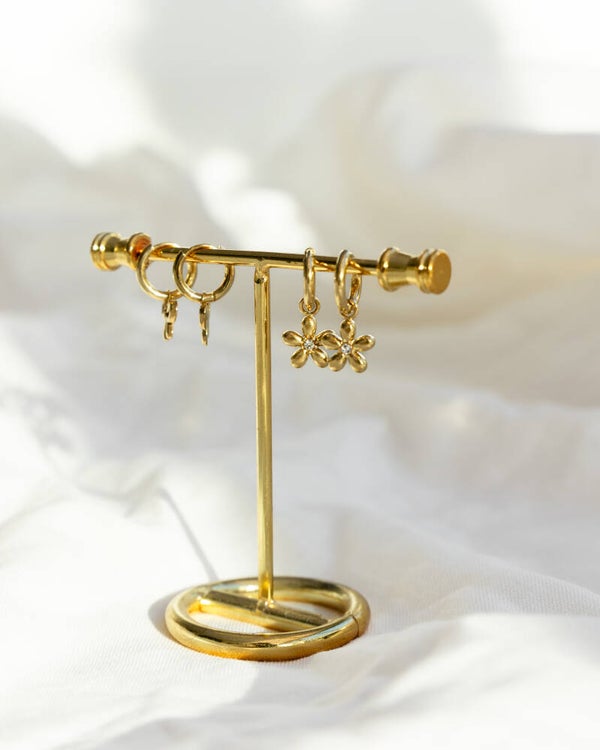 The tiny flower hoop earrings