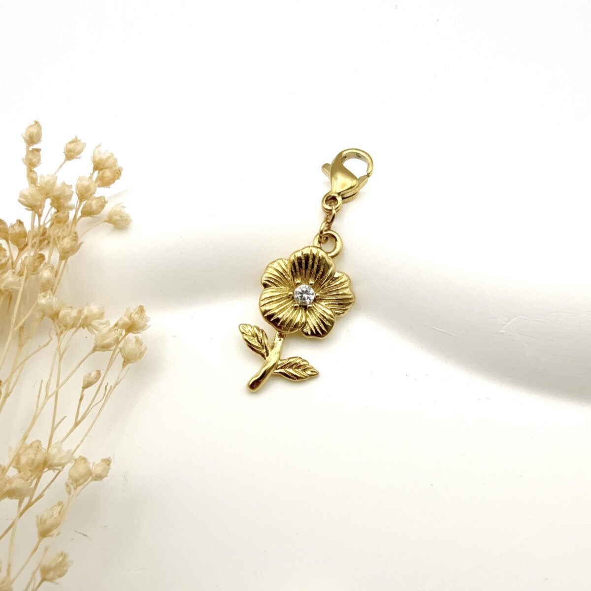 Bedel bloem met strass - Goud