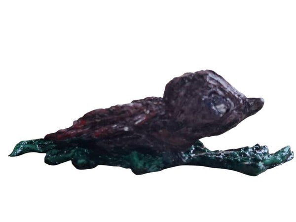 Handmade beeldje vogel op een takje