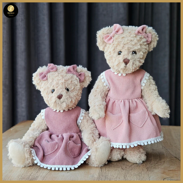 Meisjesbeer 30cm met  roze of terra cotta jurkje