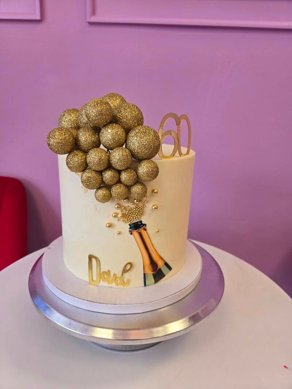 EGGLESS CHAMPAGNE BOTTLE CAKE