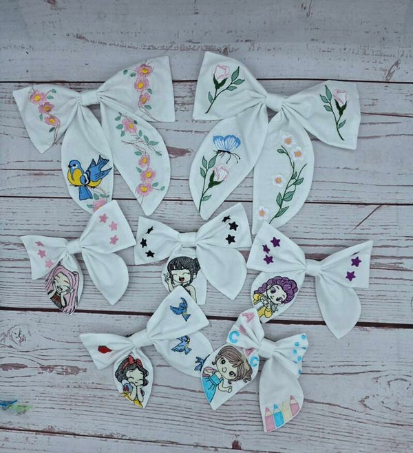 Barrettes nœuds brodés