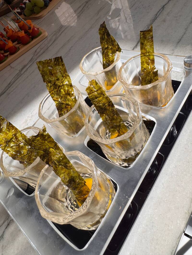 Fresh crackers paired with salmon roe or caviar, finished with a tangy twist to delight your taste buds.