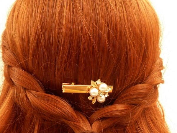 Funkelnde Haarklammer mit Perlenapplikation und klarem Strass ideal für die goldene Braut