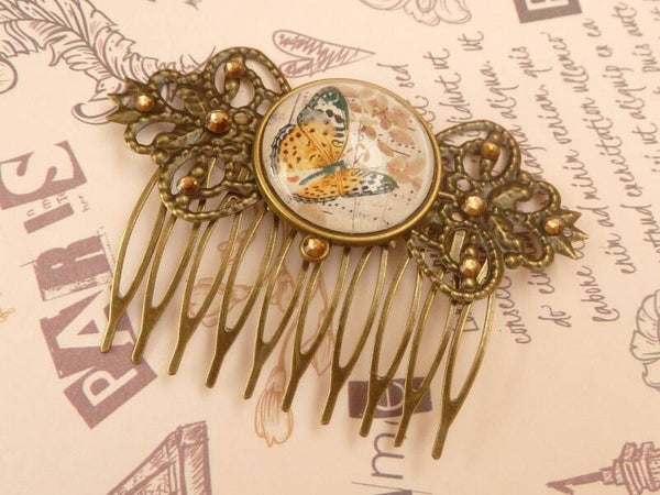 Haarkamm in Schleifenform mit schönem Schmetterling Motiv braun bronzefarben