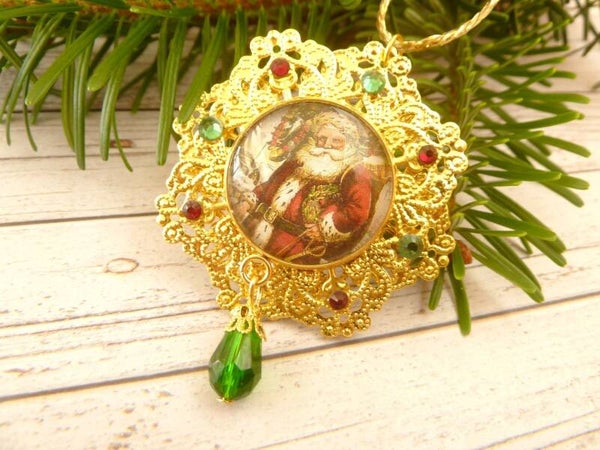 Festlicher Deko-Anhänger mit Weihnachtsmann sternförmig grün rot goldfarben