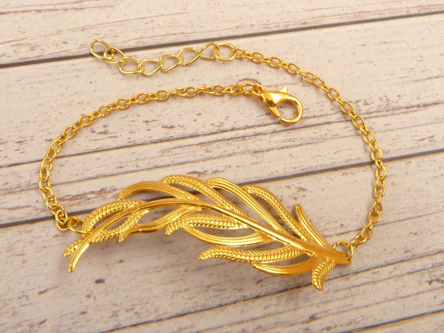Elegantes Armband mit Feder Motiv Jugenstil Design goldfarben Länge anpassbar