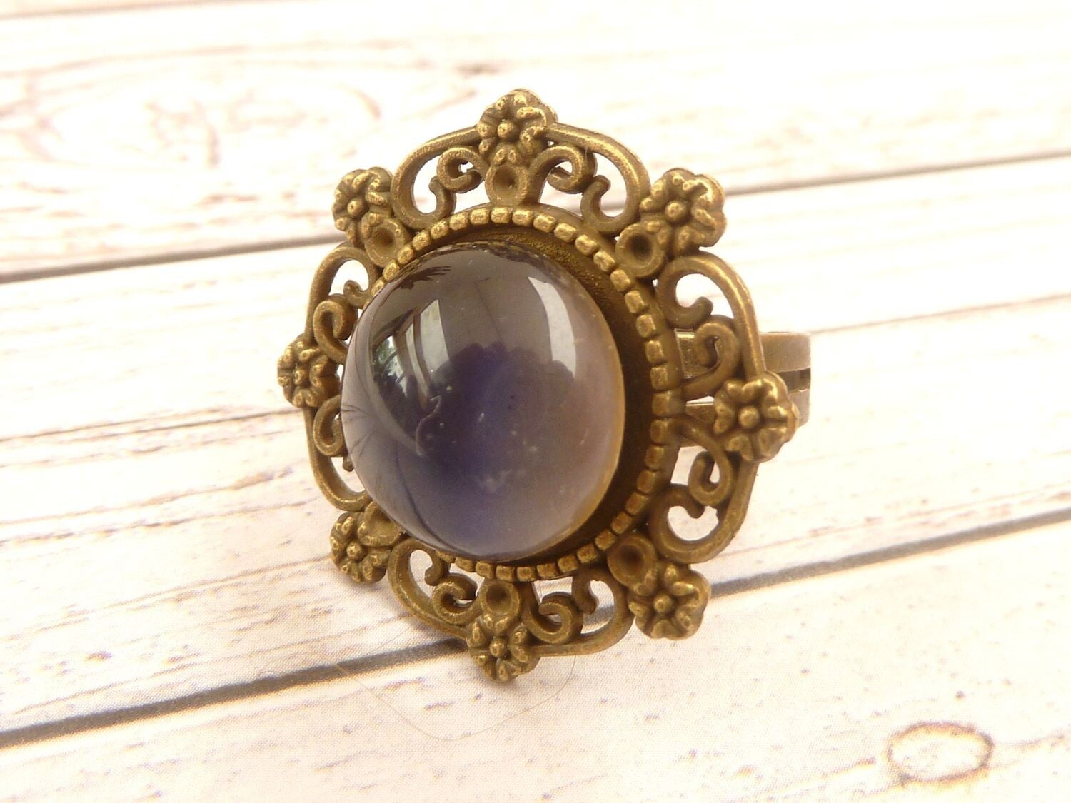 Großer Stimmungsring Farbwechsel temperatursensibler Glas Cabochon bronzefarbene Ringschiene größenverstellbar